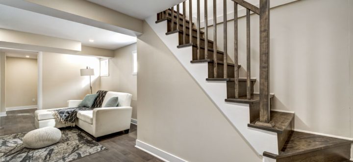 Stylish Modern Basement Living Space Modern basement living space featuring neutral tones, contemporary furniture, and stylish decorative elements, creating a cozy and inviting atmosphere.